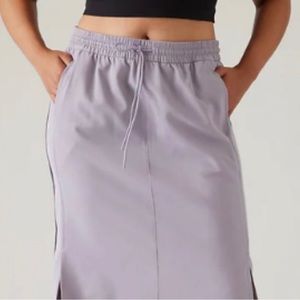 NWT Athleta Stride MIDI Skirt in Starlily Violet, size Small